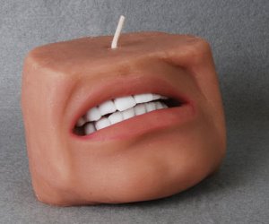 idee regalo originali candela faccia umana